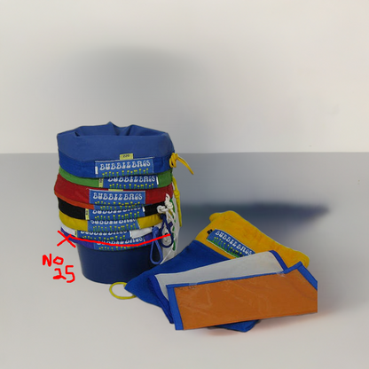 A set of eight colorful extraction bags laid out flat, each with a different color label and micron size, meant for processing plant material in a specific method.